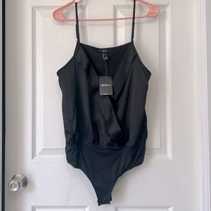 Brand new black silk bodysuit
